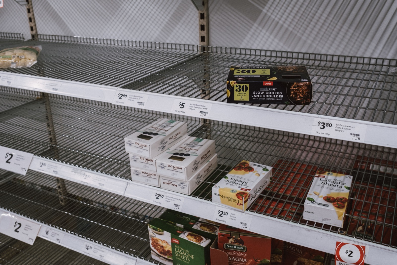 Nearly empty supermarket shelves